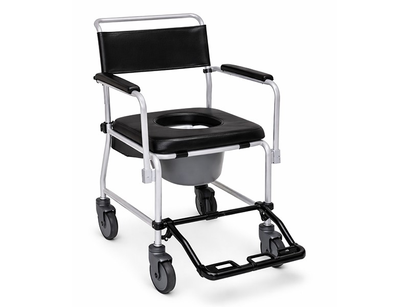 Commode with flip back arms